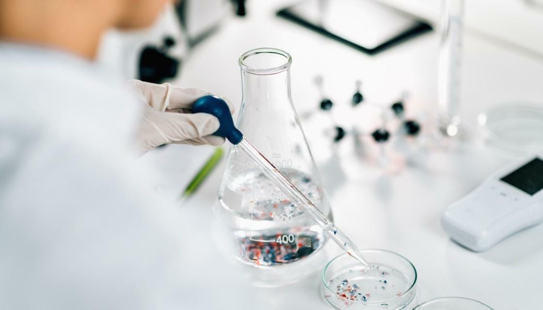 Getty microplastics nanoplastics chemistry lab pipette beaker 090124